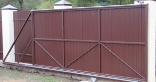 Купить откатные ворота из профнастила Балтийск, цена от 1750 руб.