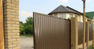Купить откатные ворота из профнастила Балтийск, цена от 1750 руб.